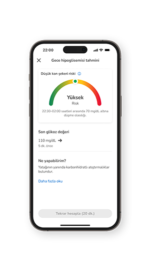 110 mg/dL okuma değeri ve yakınlardaki karbonhidrat atıştırmalıkları için önerilerle gece boyunca 'Yüksek' düşük glikoz riskini gösteren telefon ekranı.
