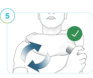 Resimde yeni bir konuma yeni bir SmartGuide sensörü uygulayan bir kişi gösterilmektedir.